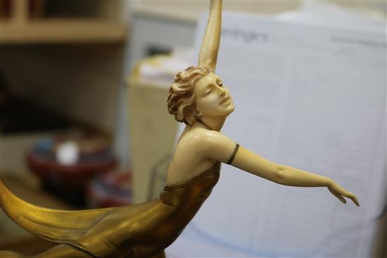 An Art Deco bronze and carved ivory figure Butterfly dancer, by Prof Otto Poertzel width 26cm height 34cm, replacement base